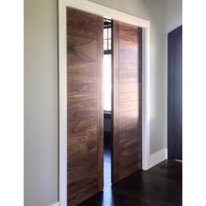 100% Bespoke natural walnut veneer pocket door