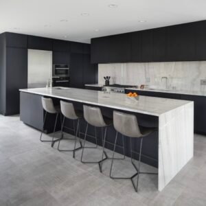 Black kitchen cabinet with white marble benchtop